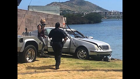 Woman dies after driving into Honolulu lagoon