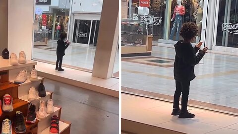 Hilarious kid pretends to be a mannequin in a sport shop