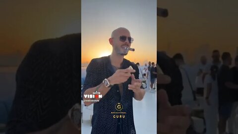 Andrew Tate Smoking cigar on yacht