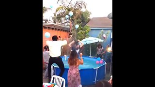 Dad Jumps Into Pool During Gender Reveal Party