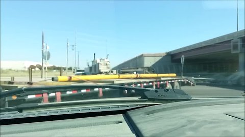 Trucks simultaneously perform horrible turns at intersection