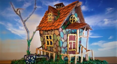 A fairy house made using cardboard and egg carton.