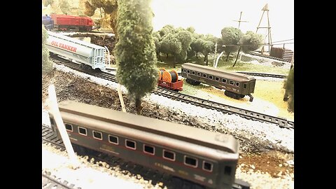 Miniature Classic Steam Train With Single Passenger Hopper Plummet At Railroad Diorama Scale 1:87