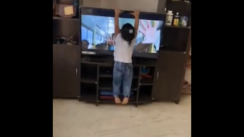 Baby girl smashed the TV while copying the movie dance