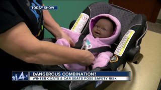 Should kids wear winter coats in car seats?