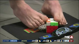 16-year-old has record for solving Rubik's cube with feet