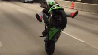 Stunt rider Mike Locascio spotted doing wheelies on highway