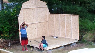2 guys try to build a shed