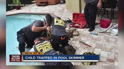 Firefighters use jackhammer to free child trapped in pool skimmer pipe