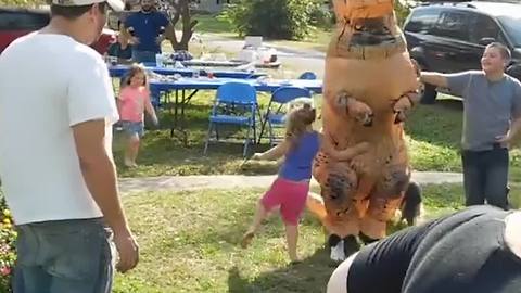 Little Girl Punches A Man In T-Rex Costume In The Crotch