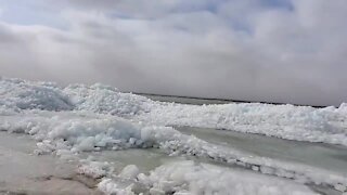 Strong winds cause massive ice pileups on Minnesota lake