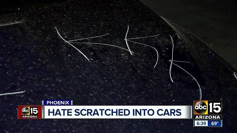 Hate messages keyed into cars in a Phoenix apartment complex