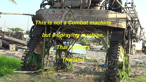 Thai Farmers this is not a combat machine but spraying machine in Thailand