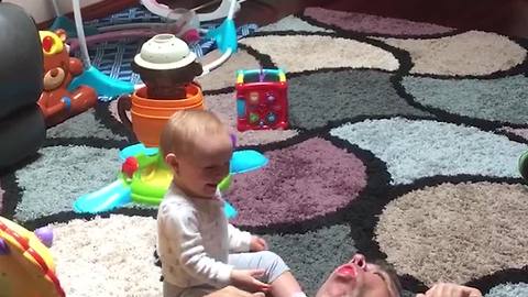 Baby Puts A Ball In Grandpa’s Mouth And Watches Him Fire It Into The Air