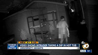 Video shows intruder taking dip in hot tub