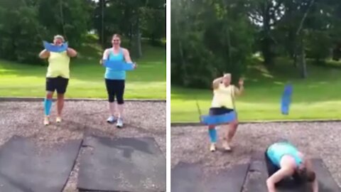 Ladies got hit with the swing and fall while doing workout