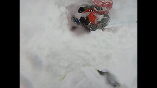 Deep Snow Swallows Up Snowmobile