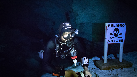Fearless scuba divers explore infamous Caracol Cenote