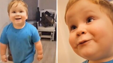 little boy is very proud of his mother for cleaning his room