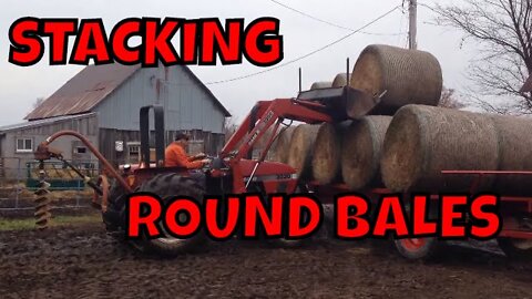 Stacking round bales