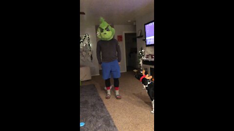Man impersonating The Grinch