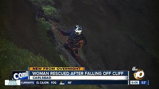 Woman rescued after falling from cliff