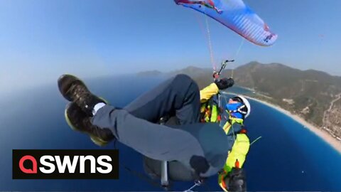 Paraglider rescued off the coast of Turkey after parachute got tangled forcing him to land on water