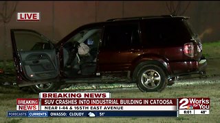SUV crashes into industrial building in Catoosa