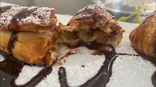 Banana with chocolate in puff pastry