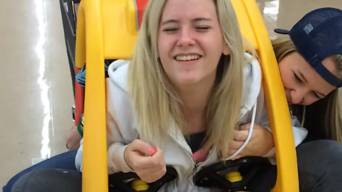 Two Teen Girls Stuck in a Toy Car Shopping Cart