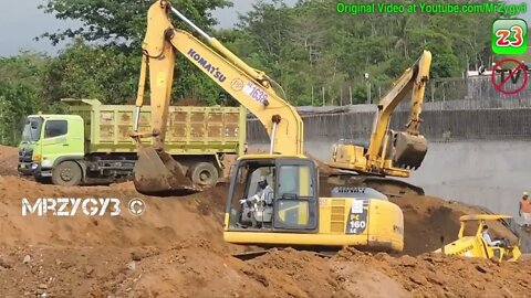 Excavator Dump Trucks Motor Grader Compactor Busy Working On Toll Road Construction