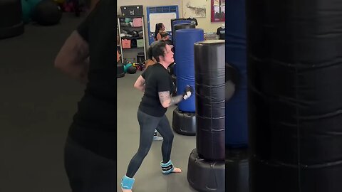 Synchronized Combo Punches on a Bag at Bochner's Studio