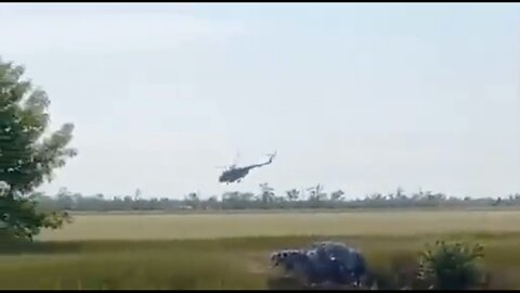 Ukrainians using a Russian-made Mi-17 helicopter transferred by the US from Afghanistan as military assistance