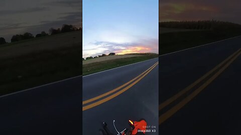 Beautiful Lancaster county sunset over cornfields on a motorcycle