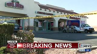 Woman shot in front of check cashing store