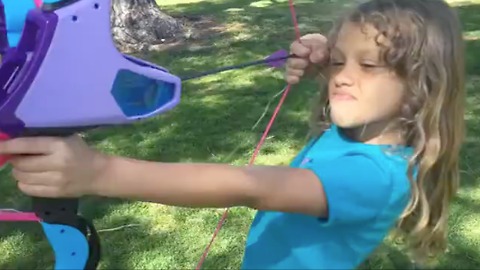 Little Girl Uses Bow and Arrow To Fearlessly Pull Her Own Tooth Out!