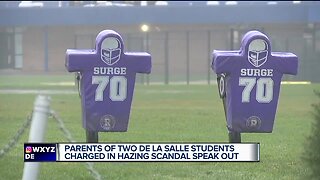 Parents of two Warren De La Salle students charged in hazing scandal speak out
