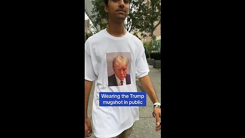 A guy Wearing the Trump mugshot in Public . See the reaction