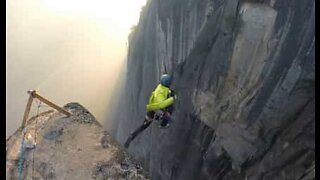 Man does terrifying cliff jump in the USA