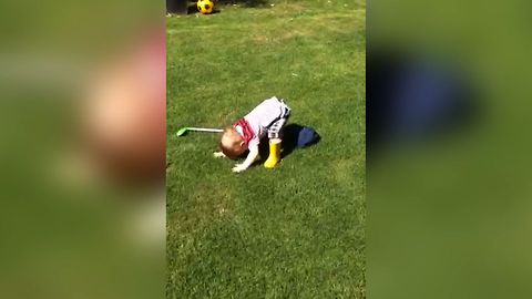 Cute Kid Adorably Fails At Golf