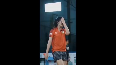 funny girl dancing on the stage of badminton