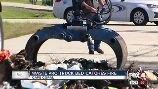 Garbage truck dumps load on the road due to fire in Cape Coral