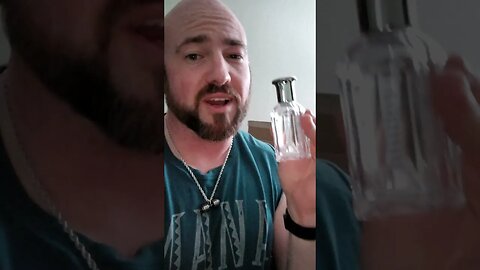 Emptying a bottle of Tommy Hilfiger Cologne