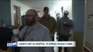 Cadets and Midshipmen visit the local VA to spread holiday cheer