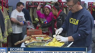 Fire fighters deliver dinner for families in need