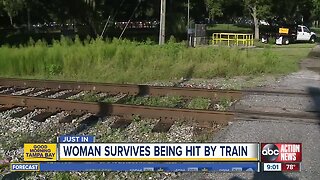 Tampa woman survives being hit by train after walking on tracks while wearing headphones