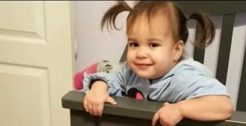 Two year-old girl doesn't need crib anymore and proves it