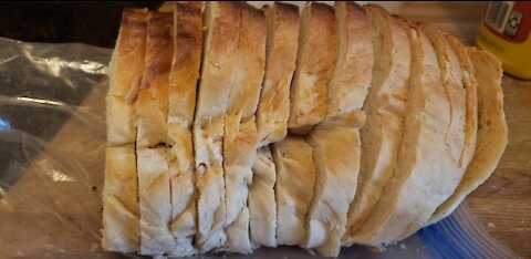 Making bread with no power tools, no power mixers and with a make shift rolling pin.