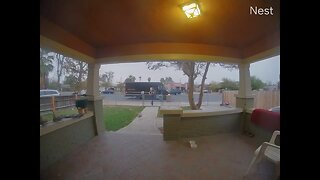 UPS employee throws package into yard