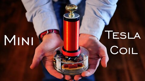 DIY 50,000 Volt Arc Lighter Powered Tesla Coil (ft. Integza)